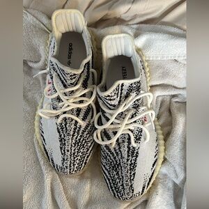 Used Yeezy shoes size 10, does not coming with box.